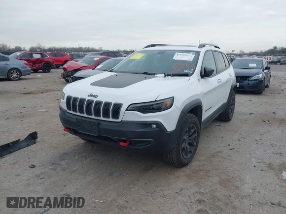 2019 Jeep Cherokee Trailhawk with VIN 1C4PJMBN6KD124023, listed as a IAAI auction lot 41432217 with 76,934 mi miles and . Bid and sale history available at DreamBid. Image 18.