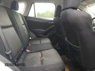 2016 Mazda CX-5 Sport с VIN JM3KE4BY4G0899953, выставлен на аукционе Copart как лот 57269035 с пробегом 196 158 миль миль и Списание • Salvage title. История ставок и продаж доступна на DreamBid. Изображение 11.