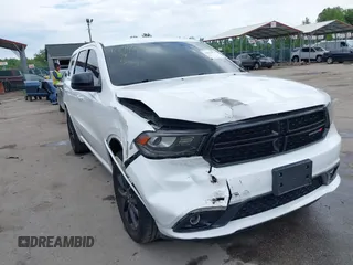 2019 Dodge Durango SXT Plus with VIN 1C4RDJAG3KC821124, listed as a IAAI auction lot 42214374 with 102,134 mi miles and . Bid and sale history available at DreamBid. Image 6.