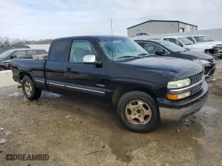 1999 Chevrolet Silverado 1500 LS with VIN 2GCEC19T3X1138386, listed as a Copart auction lot 41630275 with 124,217 mi miles and Salvage Title. Bid and sale history available at carsss.com. Image 4.
