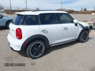2016 MINI Countryman S with VIN WMWZC5C57GWU22015, listed as a IAAI auction lot 41806547 with 65,124 mi miles and . Bid and sale history available at DreamBid. Image 4.