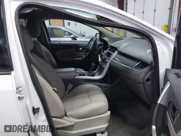2014 Ford Edge SEL z VIN 2FMDK4JC9EBB06783, wystawiony jako IAAI lot #42047206 z przebiegiem 125 963 mil mil oraz . Historia ofert i sprzedaży dostępna na DreamBid. Obrazek 5.