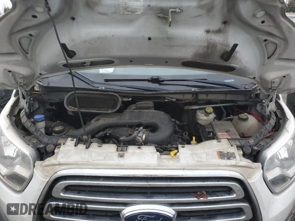 2017 Ford Transit with VIN 1FTYR1ZM3HKB29631, listed as a Copart auction lot 86395004 with 96,975 mi miles and Salvage Title. Bid and sale history available at DreamBid. Image 11.