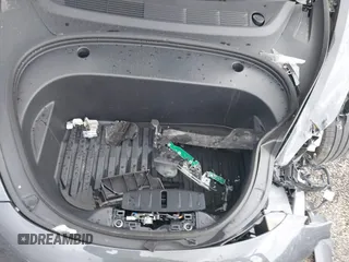 2023 Tesla Model 3 with VIN 5YJ3E1EAXPF693693, listed as a IAAI auction lot 41709704 with 12,473 mi miles and . Bid and sale history available at DreamBid. Image 10.