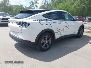 2021 Ford Mustang Mach-E Select z VIN 3FMTK1RM5MMA09245, wystawiony jako IAAI lot #42285393 z przebiegiem 97 554 mil mil oraz . Historia ofert i sprzedaży dostępna na DreamBid. Obrazek 4.