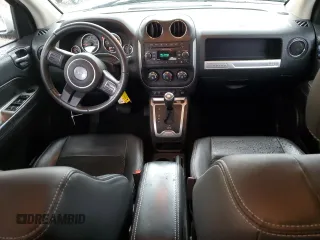 2014 Jeep Compass Latitude with VIN 1C4NJCEB6ED659912, listed as a Copart auction lot 84479464 with 187,311 mi miles and Salvage Title. Bid and sale history available at carsss.com. Image 8.