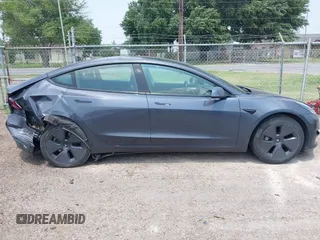 2023 Tesla Model 3 with VIN 5YJ3E1EA7PF409243, listed as a IAAI auction lot 42305360 with Not provided miles and . Bid and sale history available at DreamBid. Image 13.