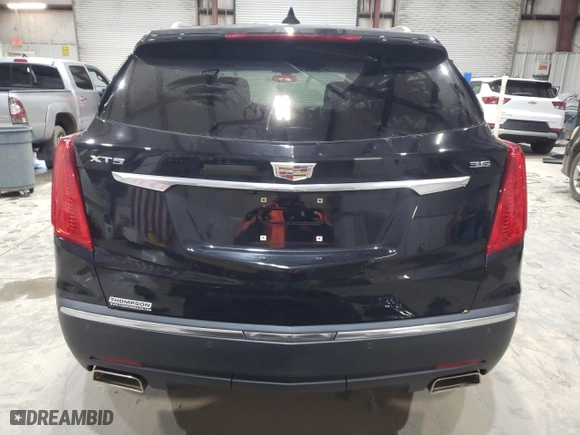 2017 Cadillac XT5 FWD with VIN 1GYKNARS4HZ212969, listed as a Copart auction lot 88758615 with 125,537 mi miles and Salvage Title. Bid and sale history available at carsss.com. Image 6.