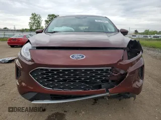 2021 Ford Escape SE z VIN 1FMCU9G6XMUA97492, wystawiony jako Copart lot #59129685 z przebiegiem 27 028 mil mil oraz Szkoda całkowita • Salvage title. Historia ofert i sprzedaży dostępna na DreamBid. Obrazek 5.