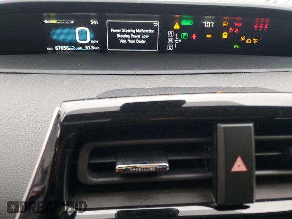 2017 Toyota Prius Two z VIN JTDKBRFU0H3056466, wystawiony jako Copart lot #56998045 z przebiegiem 67 056 mil mil oraz Szkoda całkowita • Salvage title. Historia ofert i sprzedaży dostępna na DreamBid. Obrazek 9.