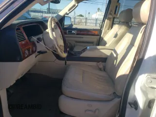 2003 Lincoln Navigator Ultimate with VIN 5LMFU27R63LJ38538, listed as a Copart auction lot 46614635 with 124,487 mi miles and Salvage Title. Bid and sale history available at carsss.com. Image 7.