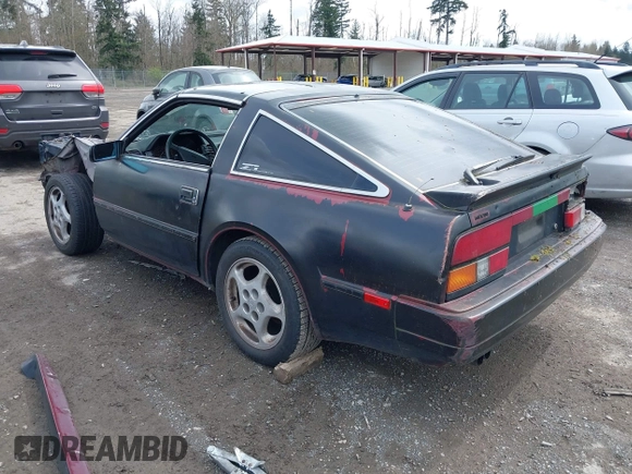 1986 Nissan 300ZX z VIN JN1HZ14S4GX140955, wystawiony jako IAAI lot #41935505 z przebiegiem 144 917 mil mil oraz . Historia ofert i sprzedaży dostępna na DreamBid. Obrazek 3.