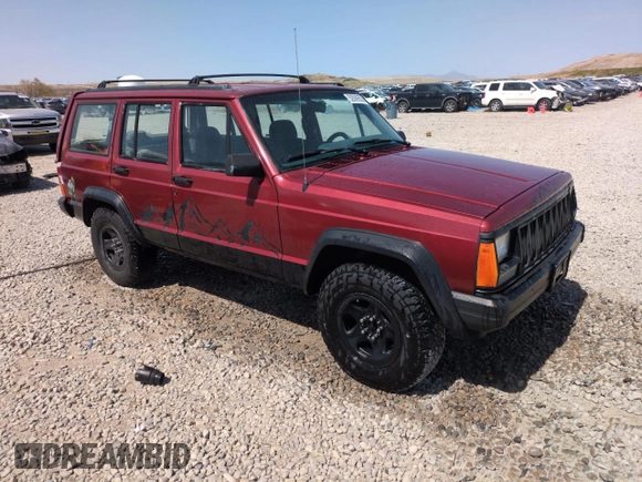 1996 Jeep Cherokee Sport with VIN 1J4FJ68S6TL171056, listed as a Copart auction lot 52099555 with 250,089 mi miles and Salvage Title. Bid and sale history available at carsss.com. Image 4.
