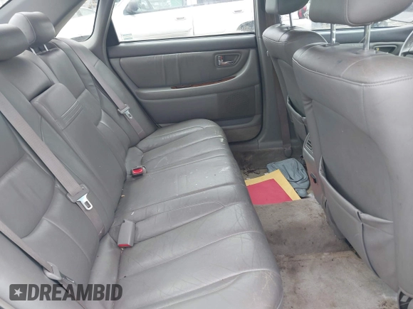 2001 Toyota Avalon XL z VIN 4T1BF28B91U144533, wystawiony jako IAAI lot #42247586 z przebiegiem 207 775 mil mil oraz . Historia ofert i sprzedaży dostępna na DreamBid. Obrazek 8.
