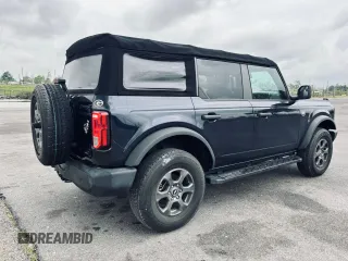 2021 Ford Bronco with VIN 1FMDE5BH8MLA83132, listed as a Copart auction lot 54382935 with 31,192 mi miles and Salvage title. Bid and sale history available at DreamBid. Image 4.