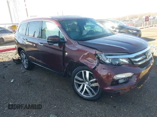 2016 Honda Pilot Touring with VIN 5FNYF6H90GB126572, listed as a IAAI auction lot 41872113 with 94,318 mi miles. Bid and sale history available at carsss.com. Image 1.