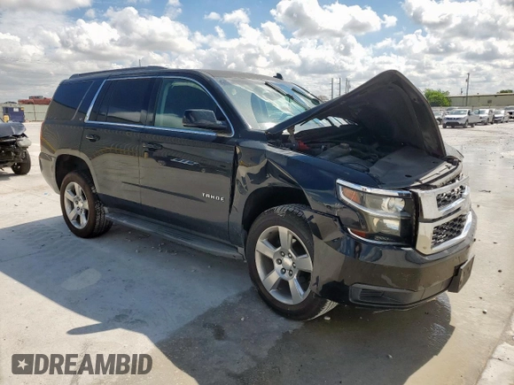 2015 Chevrolet Tahoe LT with VIN 1GNSCBKC1FR136202, listed as a Copart auction lot 62408595 with 117,869 mi miles and Salvage title. Bid and sale history available at DreamBid. Image 4.