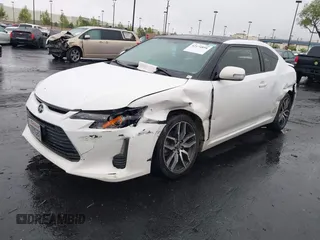 2014 Scion tC z VIN JTKJF5C77E3080128, wystawiony jako IAAI lot #42174898 z przebiegiem Nie podano mil oraz . Historia ofert i sprzedaży dostępna na DreamBid. Obrazek 17.