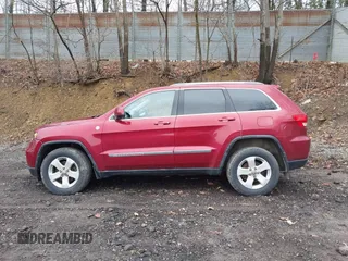2012 Jeep Grand Cherokee Laredo with VIN 1C4RJFAG7CC123669, listed as a IAAI auction lot 42001472 with 164,806 mi miles. Bid and sale history available at carsss.com. Image 15.