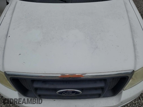 2004 Ford F-150 XL z VIN 1FTRF12W74NA73243, wystawiony jako Copart lot #54440185 z przebiegiem 147 937 mil mil oraz Szkody całkowita. Historia ofert i sprzedaży dostępna na DreamBid. Obrazek 11.