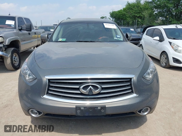 2015 Infiniti QX70 z VIN JN8CS1MU7FM380583, wystawiony jako IAAI lot #41937766 z przebiegiem 144 618 mil mil oraz . Historia ofert i sprzedaży dostępna na DreamBid. Obrazek 12.