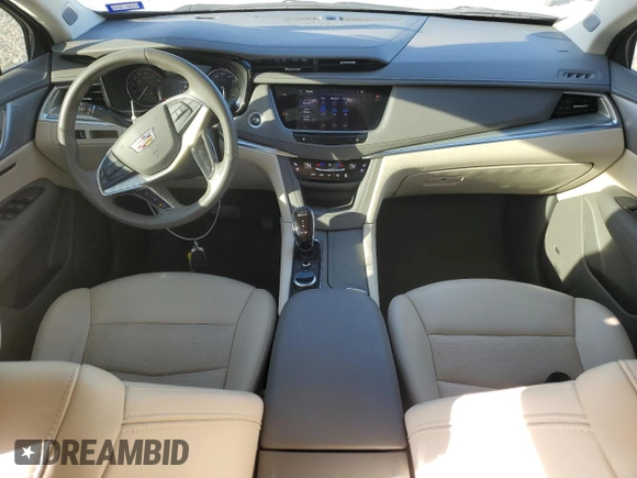 2022 Cadillac XT5 FWD Premium Luxury with VIN 1GYKNCRS1NZ125487, listed as a Copart auction lot 42081675 with 67,702 mi miles and Salvage title. Bid and sale history available at DreamBid. Image 8.