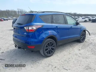 2017 Ford Escape SE with VIN 1FMCU0G94HUE90206, listed as a IAAI auction lot 42069904 with 86,883 mi miles. Bid and sale history available at carsss.com. Image 4.