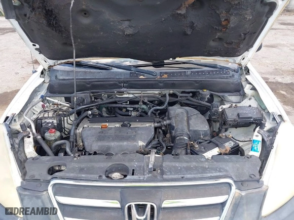 2005 Honda CR-V LX with VIN JHLRD68565C005484, listed as a IAAI auction lot 41983513 with 215,839 mi miles. Bid and sale history available at carsss.com. Image 10.