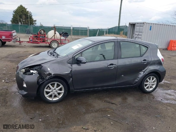 2013 Toyota Prius c One with VIN JTDKDTB31D1531200, listed as a IAAI auction lot 41685835 with 128,996 mi miles. Bid and sale history available at carsss.com. Image 14.