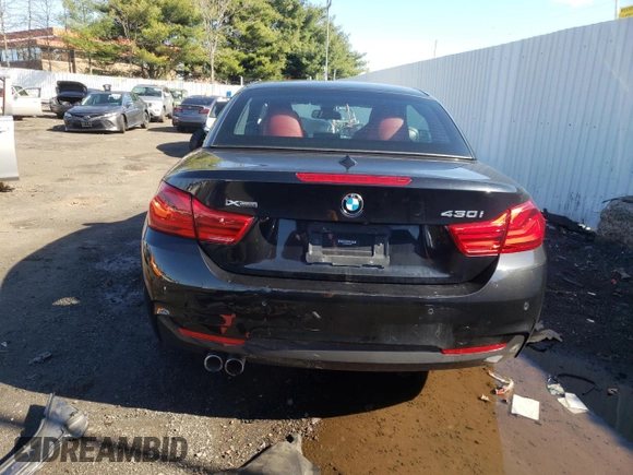 2019 BMW 4 Series 430i xDrive with VIN WBA4Z3C58KEF31811, listed as a Copart auction lot 50414074 with 55,807 mi miles and Salvage title. Bid and sale history available at DreamBid. Image 6.