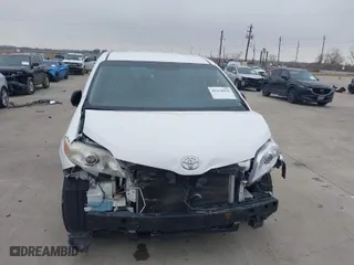 2015 Toyota Sienna L with VIN 5TDZK3DC5FS675095, listed as a IAAI auction lot 41434418 with 124,630 mi miles. Bid and sale history available at carsss.com. Image 12.