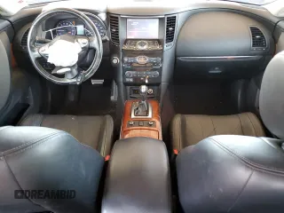 2015 Infiniti QX70 z VIN JN8CS1MW9FM481836, wystawiony jako Copart lot #57801425 z przebiegiem 130 011 mil mil oraz Szkoda całkowita • Salvage title. Historia ofert i sprzedaży dostępna na DreamBid. Obrazek 8.