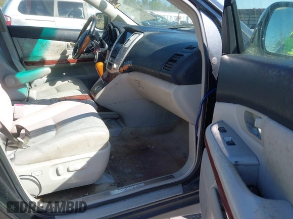 2007 Lexus RX 400h z VIN JTJGW31U372003129, wystawiony jako IAAI lot #41769911 z przebiegiem 231 097 mil mil oraz . Historia ofert i sprzedaży dostępna na DreamBid. Obrazek 5.