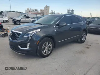 2023 Cadillac XT5 FWD Premium Luxury with VIN 1GYKNCRS1PZ164664, listed as a Copart auction lot 61396935 with 57,854 mi miles and Salvage title. Bid and sale history available at DreamBid. Image 1.
