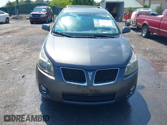 2009 Pontiac Vibe with VIN 5Y2SM67009Z462332, listed as a IAAI auction lot 42620669 with 164,227 mi miles and . Bid and sale history available at DreamBid. Image 6.