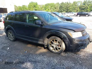 2013 Dodge Journey R/T with VIN 3C4PDDEG4DT691056, listed as a IAAI auction lot 42535196 with 198,307 mi miles and . Bid and sale history available at DreamBid. Image 1.