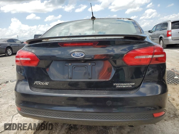2015 Ford Focus Titanium with VIN 1FADP3J28FL362590, listed as a Copart auction lot 59759495 with 58,644 mi miles and Clean title. Bid and sale history available at DreamBid. Image 6.