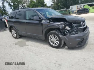 2017 Dodge Journey SXT z VIN 3C4PDCBG9HT515799, wystawiony jako Copart lot #62827975 z przebiegiem 156 215 mil mil oraz Szkoda całkowita • Salvage title. Historia ofert i sprzedaży dostępna na DreamBid. Obrazek 4.