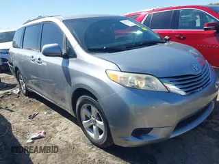 2015 Toyota Sienna LE AAS with VIN 5TDKK3DC5FS575998, listed as a IAAI auction lot 42033354 with 176,433 mi miles and . Bid and sale history available at DreamBid. Image 1.