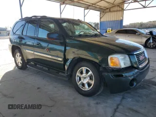 2004 GMC Envoy SLT z VIN 1GKDS13S942127830, wystawiony jako Copart lot #87165024 z przebiegiem 172 592 mil mil oraz Szkoda całkowita • Salvage title. Historia ofert i sprzedaży dostępna na DreamBid. Obrazek 4.