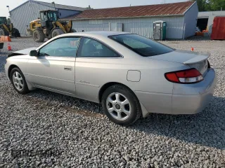 2000 Toyota Solara SE z VIN 2T1CF28P5YC267645, wystawiony jako Copart lot #60543605 z przebiegiem 58 938 mil mil oraz Szkoda całkowita • Salvage title. Historia ofert i sprzedaży dostępna na DreamBid. Obrazek 2.