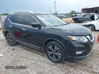 2018 Nissan Rogue SV with VIN JN8AT2MT8JW465012, listed as a IAAI auction lot 39376292 with 184,861 mi miles and . Bid and sale history available at carsss.com. Image 1.