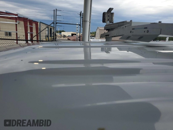 2014 Chevrolet Express Cargo with VIN 1GCWGFCA8E1121812, listed as a IAAI auction lot 42801147 with 128,506 mi miles and . Bid and sale history available at DreamBid. Image 6.