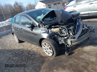 2015 Ford Fiesta SE z VIN 3FADP4EJ7FM120475, wystawiony jako IAAI lot #41186077 z przebiegiem Nie podano mil oraz . Historia ofert i sprzedaży dostępna na DreamBid. Obrazek 1.