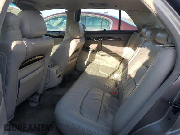 2002 Cadillac DeVille DHS z VIN 1G6KE57Y32U107755, wystawiony jako Copart lot #52811235 z przebiegiem 111 141 mil mil oraz Nie do naprawy. Historia ofert i sprzedaży dostępna na DreamBid. Obrazek 10.