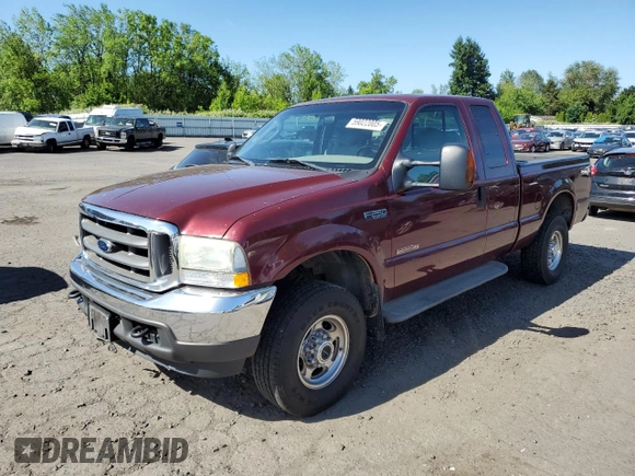2004 Ford F-250 XL with VIN 1FTNX21P64EB90565, listed as a Copart auction lot 59022005 with 223,577 mi miles and Salvage title. Bid and sale history available at DreamBid. Image 1.