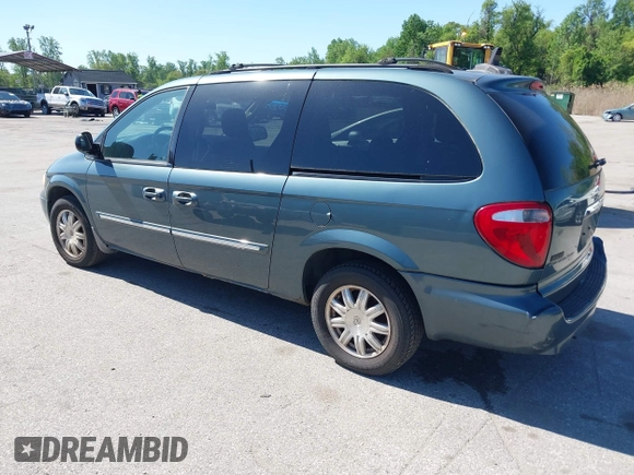2007 Chrysler Town & Country LWB Touring with VIN 2A4GP54L47R167189, listed as a IAAI auction lot 42143590 with 165,547 mi miles. Bid and sale history available at carsss.com. Image 3.