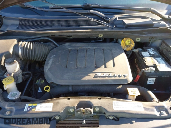 2016 Chrysler Town & Country Touring with VIN 2C4RC1BG6GR245495, listed as a IAAI auction lot 41410233 with 143,348 mi miles and . Bid and sale history available at DreamBid. Image 10.