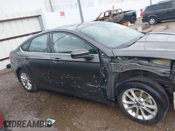 2019 Ford Fusion Hybrid SE with VIN 3FA6P0LU3KR108898, listed as a IAAI auction lot 41882847 with 159,076 mi miles. Bid and sale history available at carsss.com. Image 14.