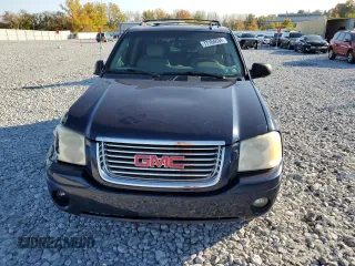 2008 GMC Envoy SLE2 with VIN 1GKDT13S882100069, listed as a Copart auction lot 77164634 with 206,709 mi miles and Salvage Title. Bid and sale history available at DreamBid. Image 5.